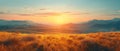 A peaceful sunrise over a mountain range Royalty Free Stock Photo