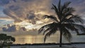 Peaceful sunset in the Maldives. The clouds shine golden in the sun`s rays.