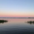 Peaceful Sunset Over Calm Lake Water Royalty Free Stock Photo