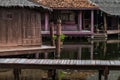 Peaceful thai floating architecture with traditional wooden house and bridge in Ancient City