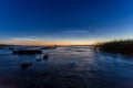 Peaceful twilight over sea with old broken jetty Royalty Free Stock Photo