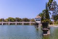 Ujung Water Palace known as Ujung Park or Sukasada Park with footbridge leading over pond in Bali, Indonesia, Asia