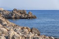 Peaceful view of sea stone rocky coast beach with blue sea