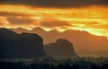 Peaceful view of Vinales valley at sunrise. Aerial View of the Vinales Valley in Cuba. Morning twilight and fog. Fog at dawn in th Royalty Free Stock Photo