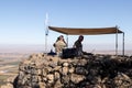 The peacekeeper from the UN forces looks toward Syria, being on a fortified point on Mount Bental, on the Golan Heights in Israel. Royalty Free Stock Photo