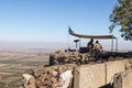 The peacekeeper from the UN forces looks toward Syria, being on a fortified point on Mount Bental, on the Golan Heights in Israel. Royalty Free Stock Photo