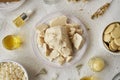 Peaces of shea butter or karite with other ingredients for natural cosmetics Royalty Free Stock Photo