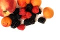 Peach, apricot, BlackBerry and raspberry isolated on white background Royalty Free Stock Photo