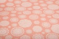 Peach background with snowflakes cut out of paper, scrapbooking paper Royalty Free Stock Photo