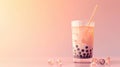 Refreshing peach-colored bubble tea with tapioca pearls on a pastel background. Royalty Free Stock Photo