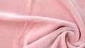 Twisted peach color velvet fabric texture Royalty Free Stock Photo