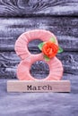 Peach eight with flower, word March