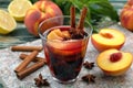 Peach fruit in red wine glass Royalty Free Stock Photo