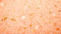 Peach Fuzz terrazzo pattern background, granite terrazzo flooring grunge vintage background.