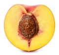Fresh peach half isolated on white background Royalty Free Stock Photo