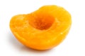 Peach half isolated on white background. Royalty Free Stock Photo