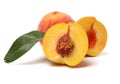 Peach with leaves and half piece Royalty Free Stock Photo