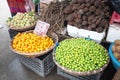 Peach Orange Lime Ginseng and Cassava on basket in Morning Market.