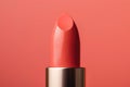 Serene Glam: Peach Fuzz Lipstick in Soft Background.