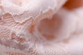 Peach pink fabric textile material texture openwork mesh macro Royalty Free Stock Photo