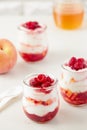 Peach and raspberry dessert with yogurt cream