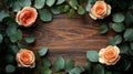 Peach Roses and Eucalyptus Leaves on Wood Royalty Free Stock Photo