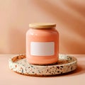PeachColored Jar with Wooden Lid on Terrazzo Tray Royalty Free Stock Photo
