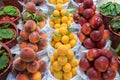 Peaches, apricots and nectarines for sale at city market.