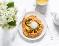 Peaches galeta with ice cream, green tea, flowers on a light background, top view. Flat lay Royalty Free Stock Photo