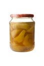 Peaches in a glass jar on a white background. Royalty Free Stock Photo