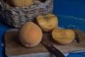 Peaches, seasonal fruit in a wicker bowl Royalty Free Stock Photo