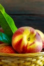 Peaches in weaved basket