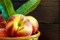 Peaches in weaved basket