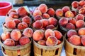 Peaches on a weekly street market stall Royalty Free Stock Photo