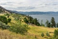 PEACHLAND, CANADA - AUGUST 02, 2020: Sky with white clouds above small mountains in okanagan valley Canada