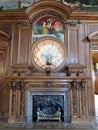 A peacock sculpture over a fireplace in a large dining room at Izrael PoznaÃâski\'s Palace, Lodz, Poland