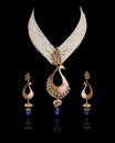 A Peacock Shaped Golden Necklace with earring,