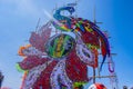 Peacock-shaped kite made of tissue paper, with bamboo on the back