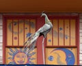 Peacock statue atop 1st floor of the Cosmic Cafe on Oak Lawn in Dallas, Texas.