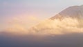 Peak close up Fuji volcano over white cloud Royalty Free Stock Photo