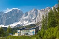 On peak of Dachstein and view alpine mountains