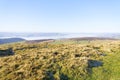 On Stanage Edge high In the Derbyshire Peak District dense fog lingers in the valley and low ground Royalty Free Stock Photo