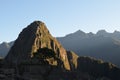 The peak of Huayna Picchu catches the morning sunlight. Machu Picchu, Cuzco, Peru