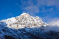 Peak of Mount Annapurna South on sunrise, Annapurna Conservation Area, Himalaya, Nepal. Royalty Free Stock Photo
