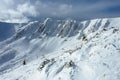 Peak of the Mountain. Beautiful landscape on the cold winter day. View of high mountains with snow white peaks. Royalty Free Stock Photo