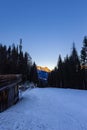 The peak of the mountains of the dolomites during sunset. High mountain landscape of the Dolomites in winter. Fantastic orange