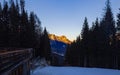 The peak of the mountains of the dolomites during sunset. High mountain landscape of the Dolomites in winter. Fantastic orange