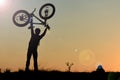 Peak passion of a successful mountain biker Royalty Free Stock Photo