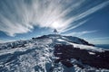 Peak pyramid of Jebel Toubkal with unusual hairy clouds formations