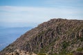 peak of a rocky mountain in a national park looking over a city below, mt wellington hobart tasmania australia Royalty Free Stock Photo